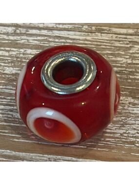 TROLLBEADS murano glass bead sterling silver core red/orange white ‘eyes’
